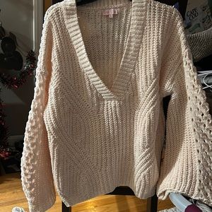 Sweater with bell sleeves